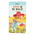 A board game box with an illustration of a red barn, fields, and sheep, with game play cards displayed in front.