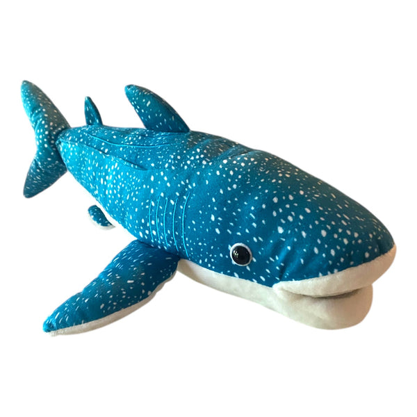 A plush toy resembling a whale shark, primarily blue with white patterns, with a soft toy texture.