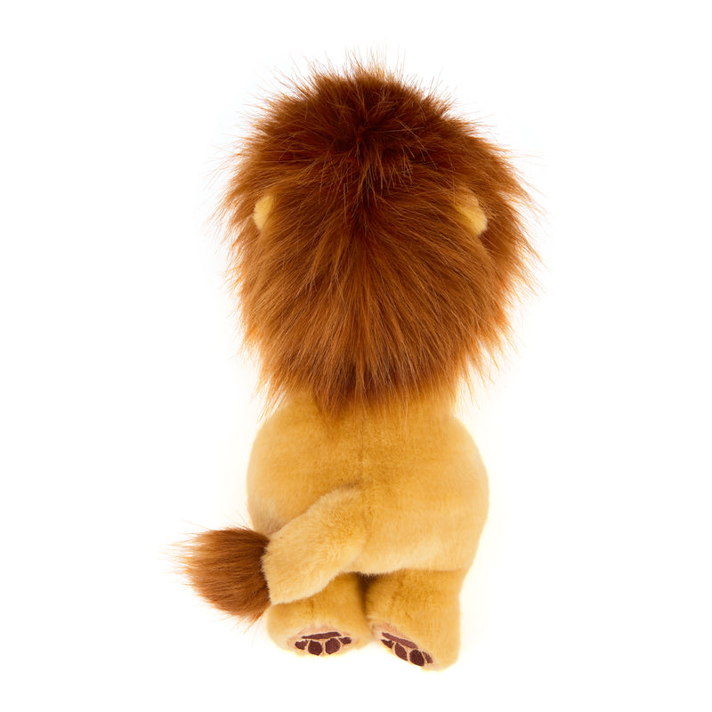 Plush lion toy from behind on a white background