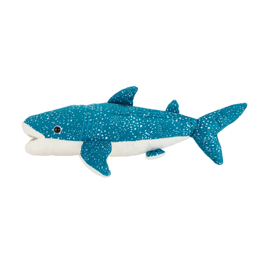 Blue and white shark plush toy on a white background