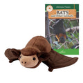 Plush bat toy next to a book titled 'Bats and Other Animals' on a white background
