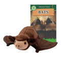 Plush bat toy next to a book titled 'Bats' on a white background