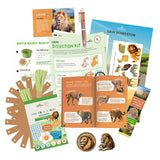 edZOOcation Conservationist Box for ages 9-12 with lion plush, animal dissection kit, ecosystem poster, and wildlife research activities