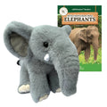 Plush elephant toy with a book titled 'All You Need to Know About Elephants' on a white background