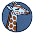 Embroidered patch of a giraffe's head on a blue background