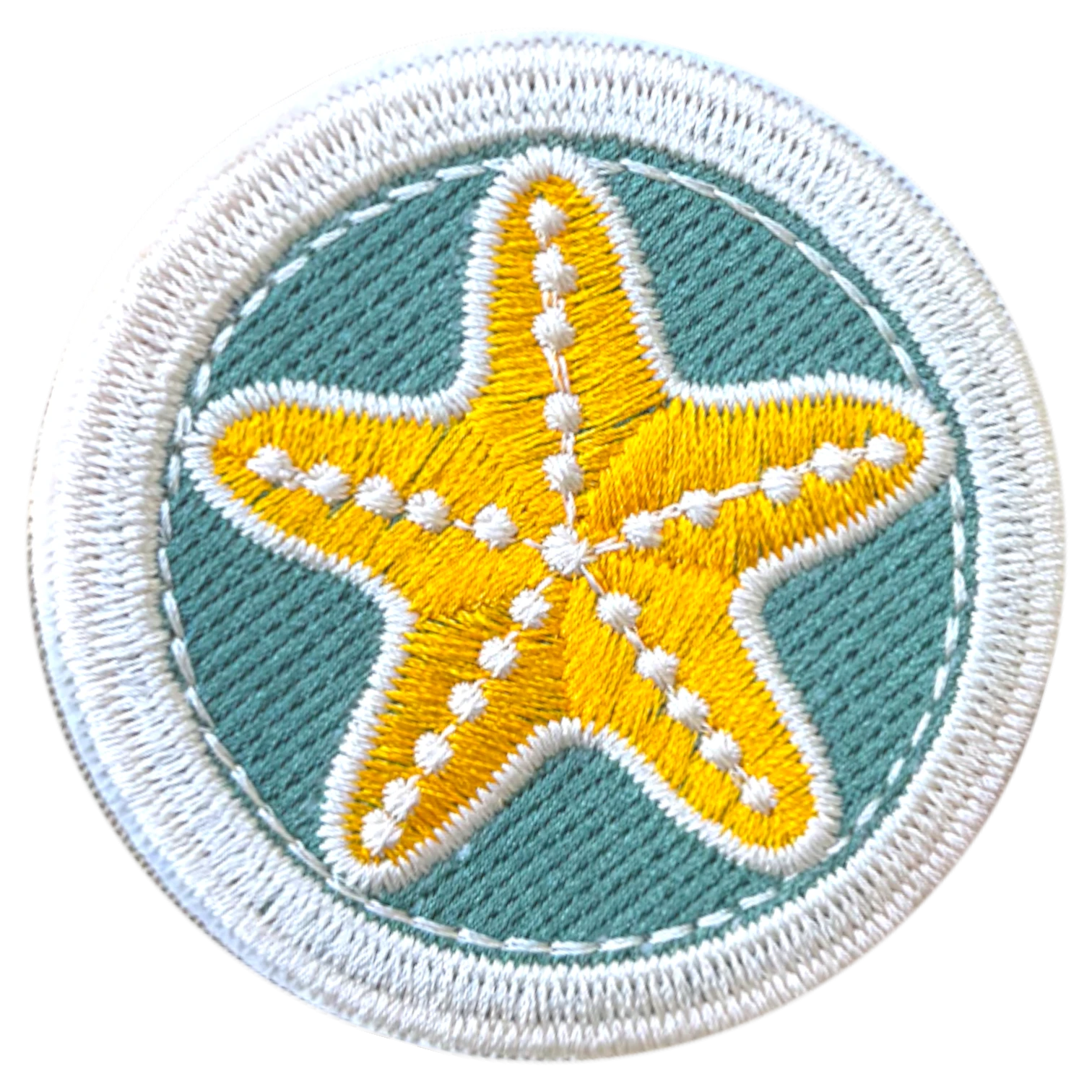 Embroidered patch with a yellow starfish on a teal background