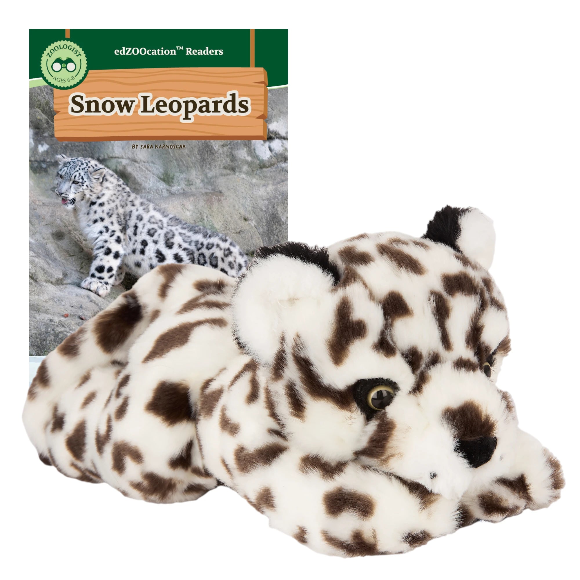 Plush snow leopard toy in front of a book titled 'Snow Leopards' by edZOOcation Readers.