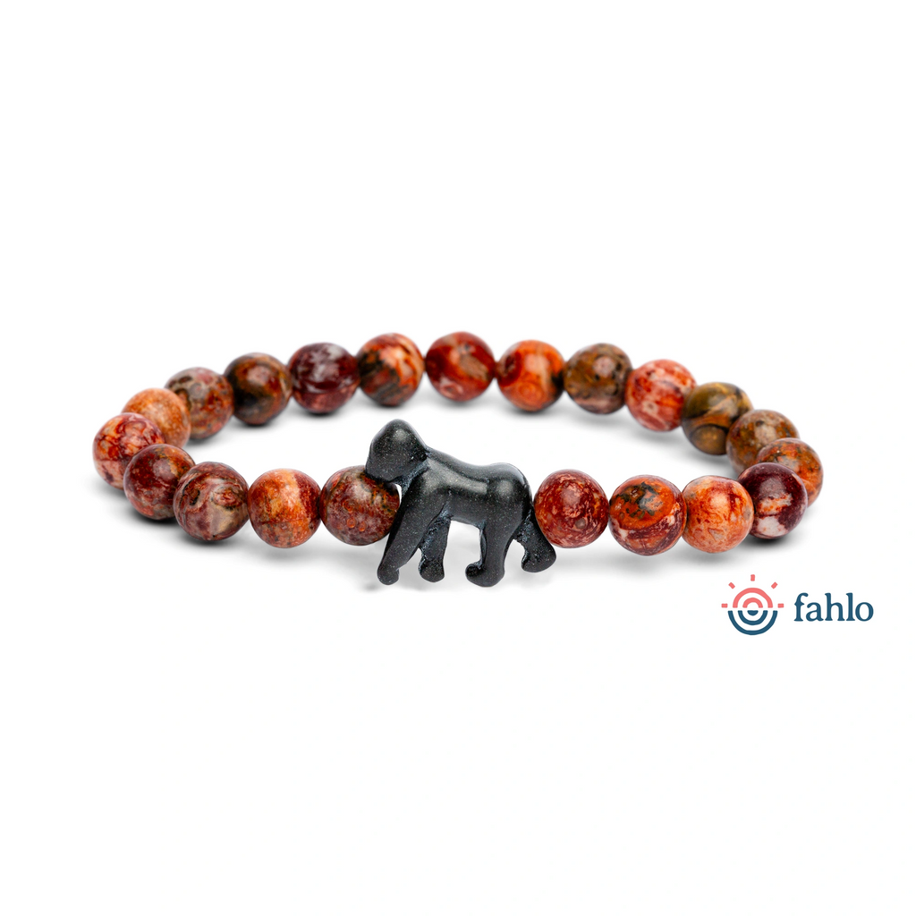 Bracelet with red and brown beads and a black animal figure on a white background, featuring the brand 'fahlo'.