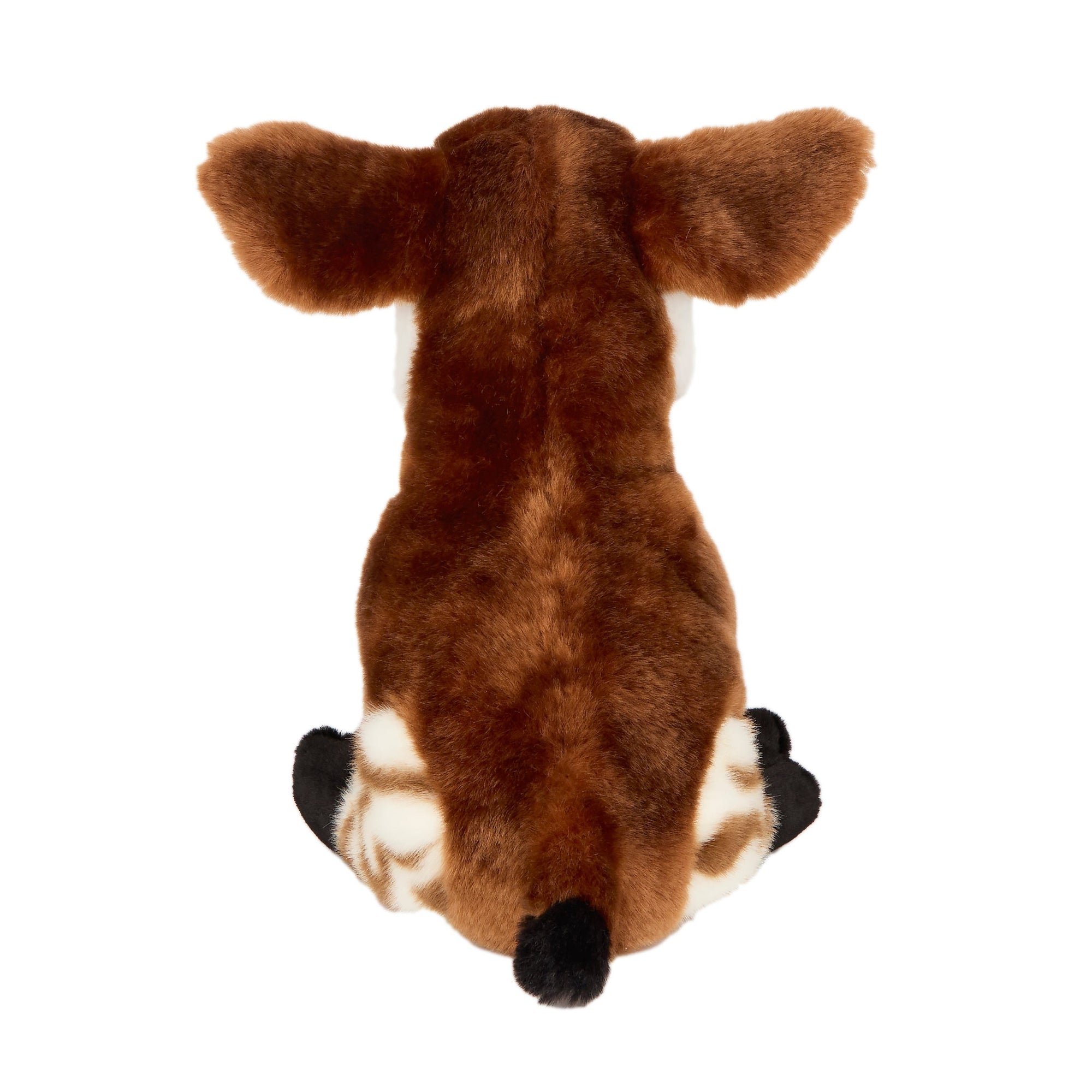 Plush toy okapi with brown fur and white stripes on a white background