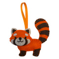 Handmade felt red panda ornament with orange, black, and white colors, featuring simple stitching and a hanging loop.